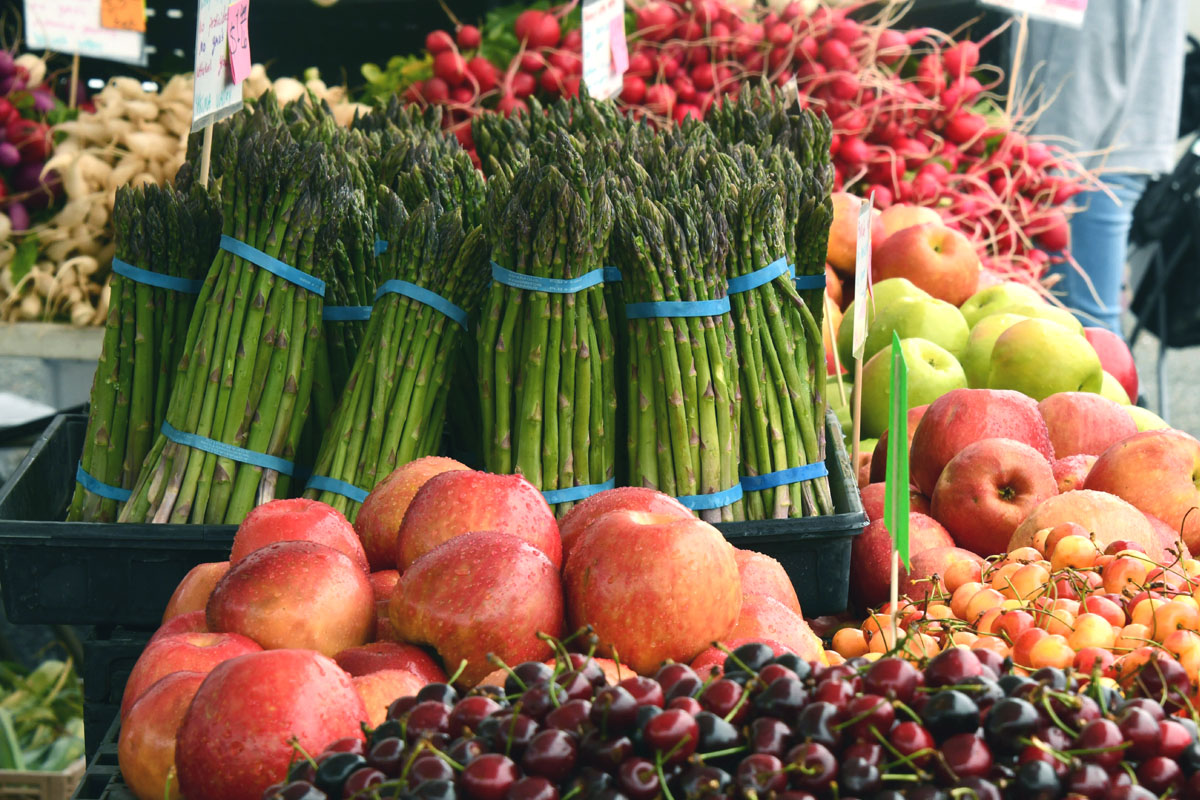 Vegetables and fruits at a farmer's market during the spring equinox.