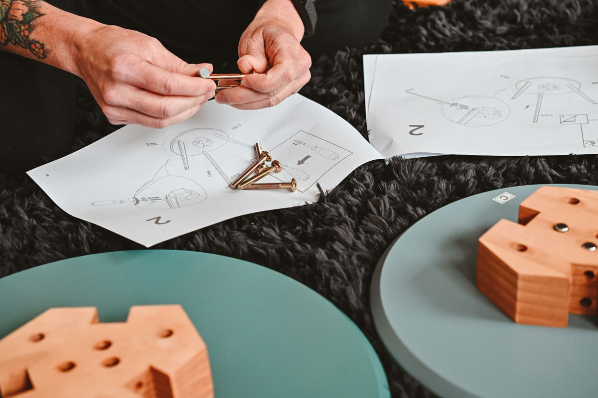 A man works on a DIY project during the spring equinox.