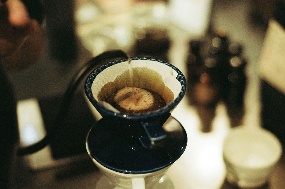 Coffee being poured over with hot water. 