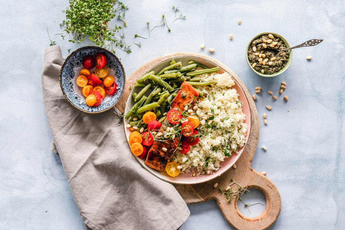 A nourishing meal full of vegetables lays on a counter in an example of an easy task on a sunday reset checklist. 