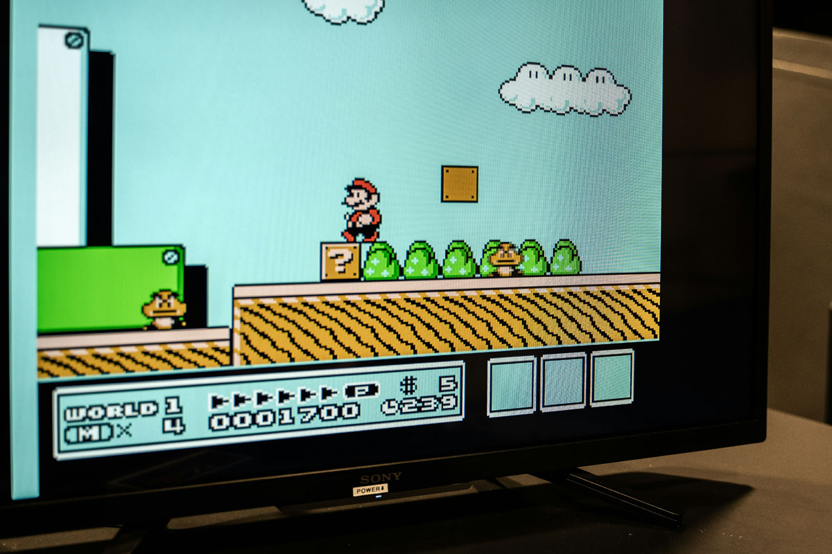 A screen showing the Mario Brothers video game.